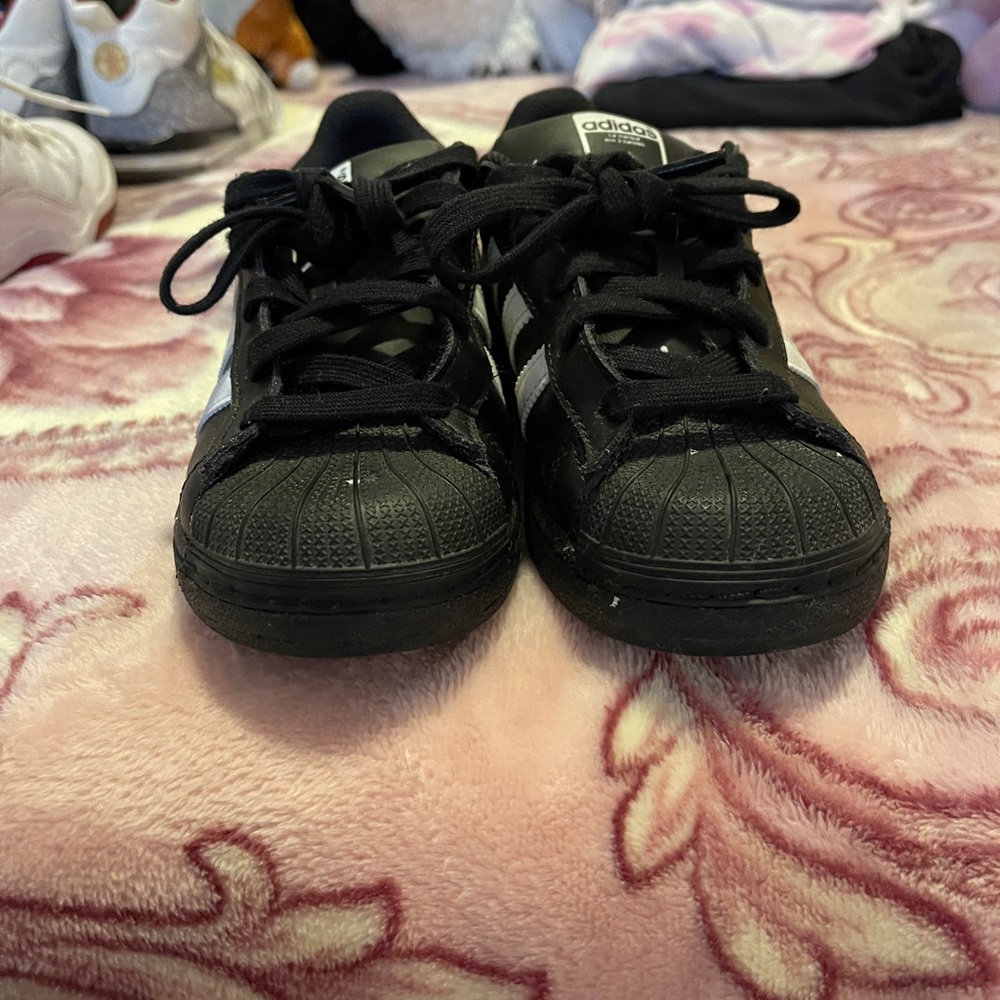 Black and white adidas 1.5 Y